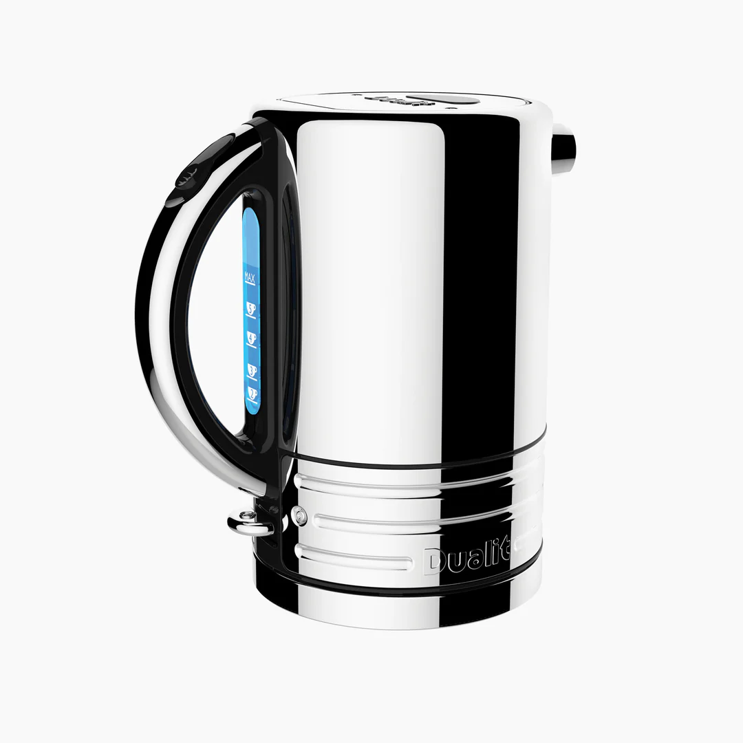 Modern stainless steel kettle on marble kitchen countertop